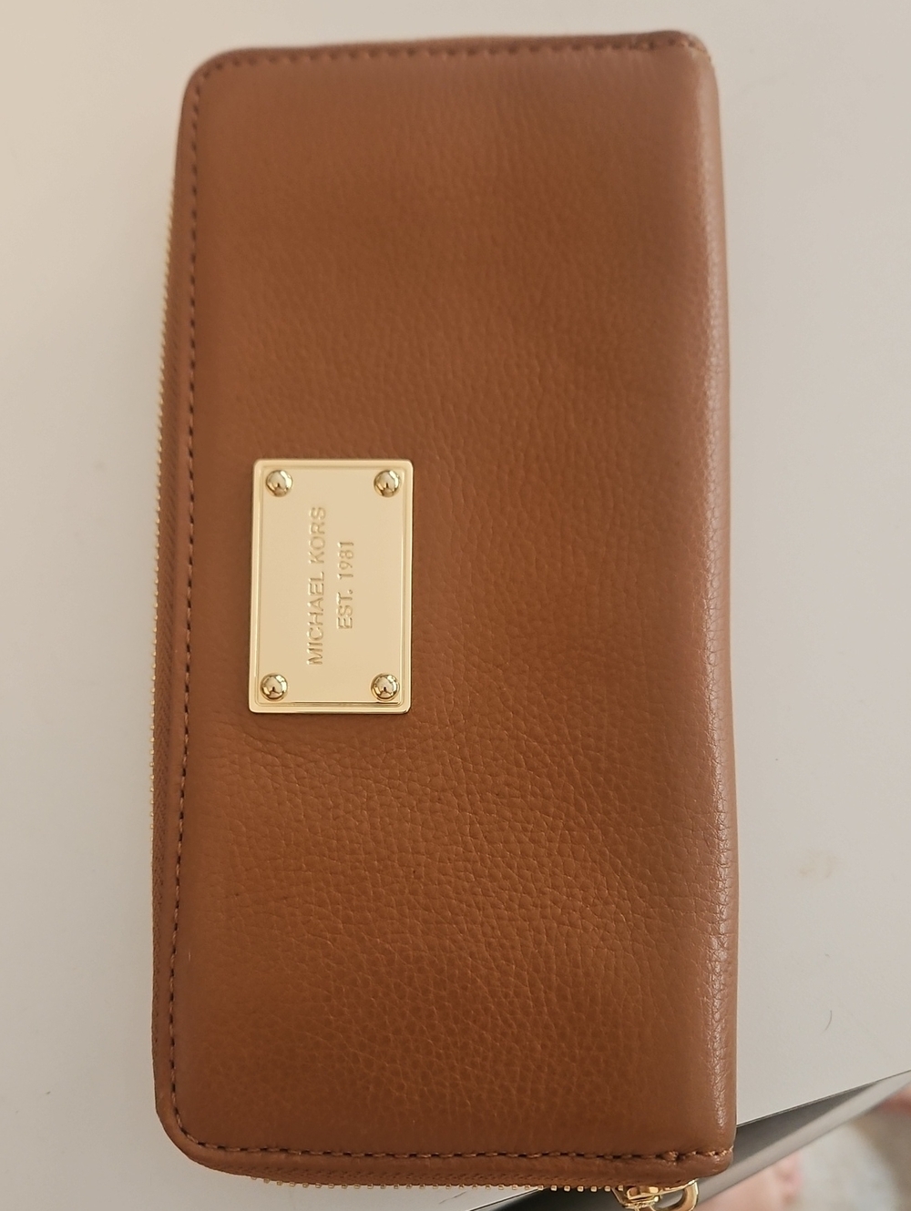 Michael Kors Brown Leather Zip Around Wallet with Gold Plaque